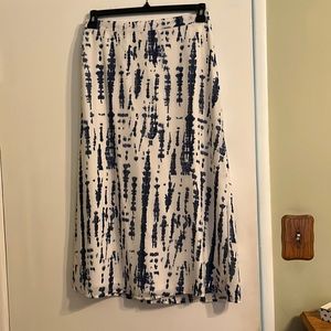 Fully lined tie dye print midi skirt. Pull on with elastic at back of waist